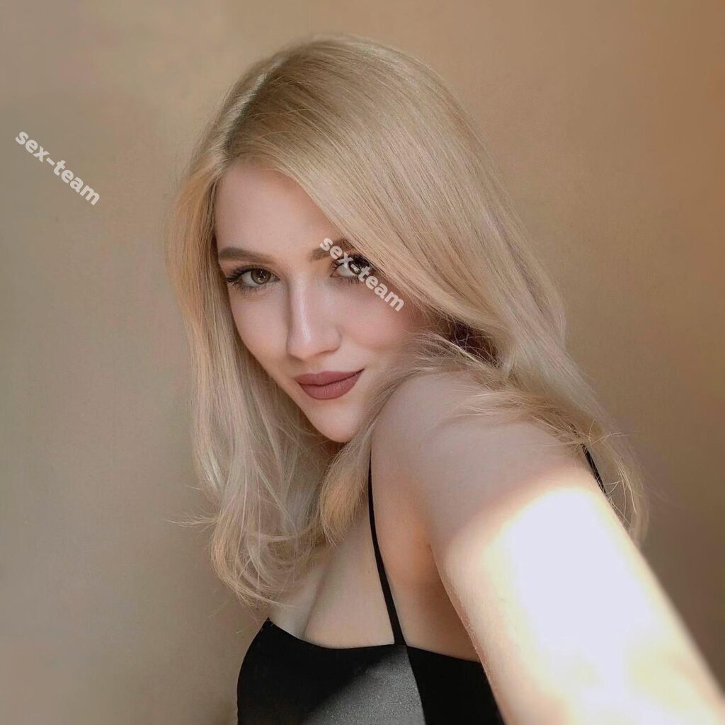 Оля